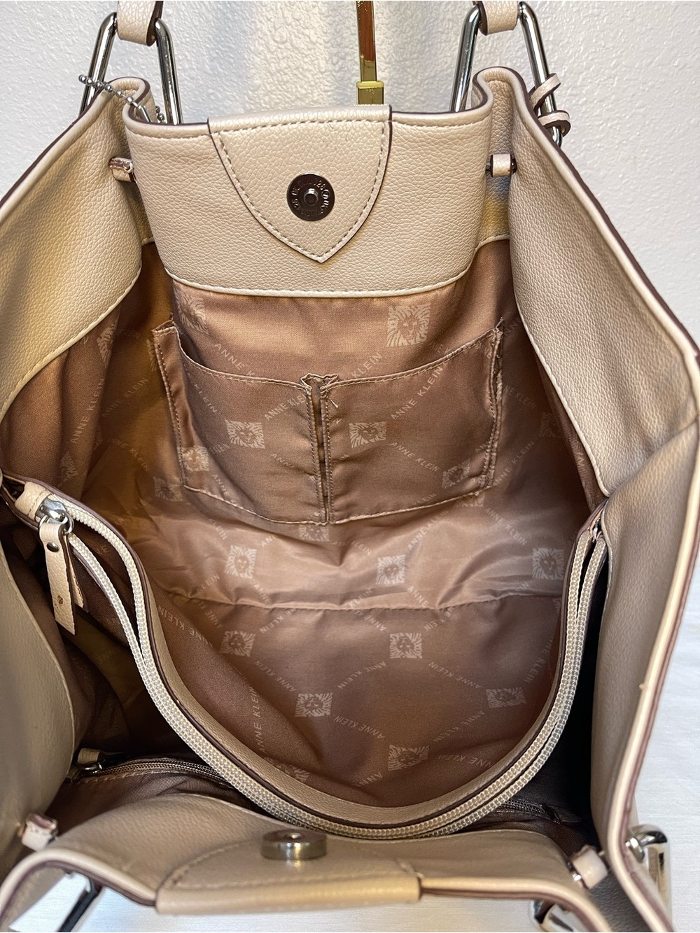 Anne Klein Taupe Vegan Pebbled Texture Tote with Lion & Tassel Charms - Picture 9 of 16